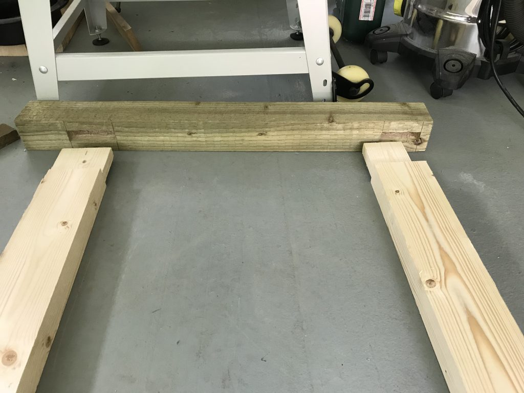 A rear leg and top and botom stretchers.