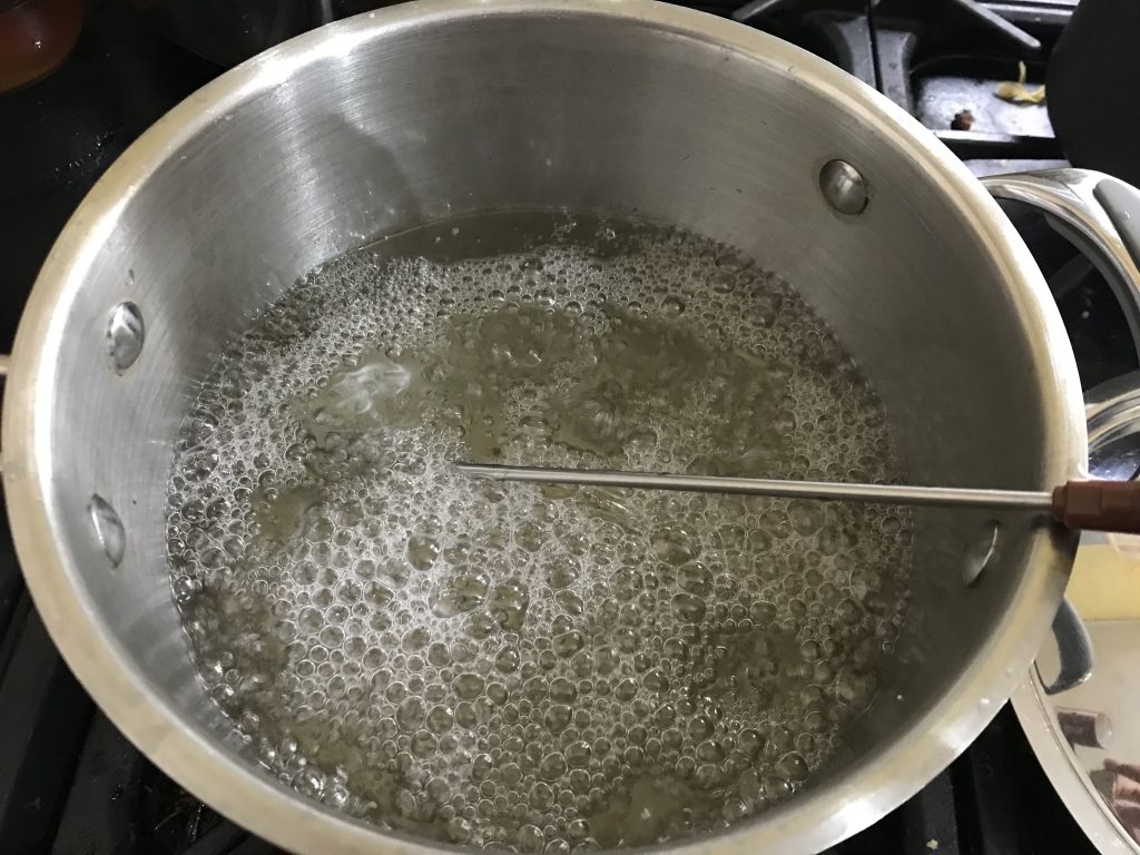 A boiling pan of sugar syrup