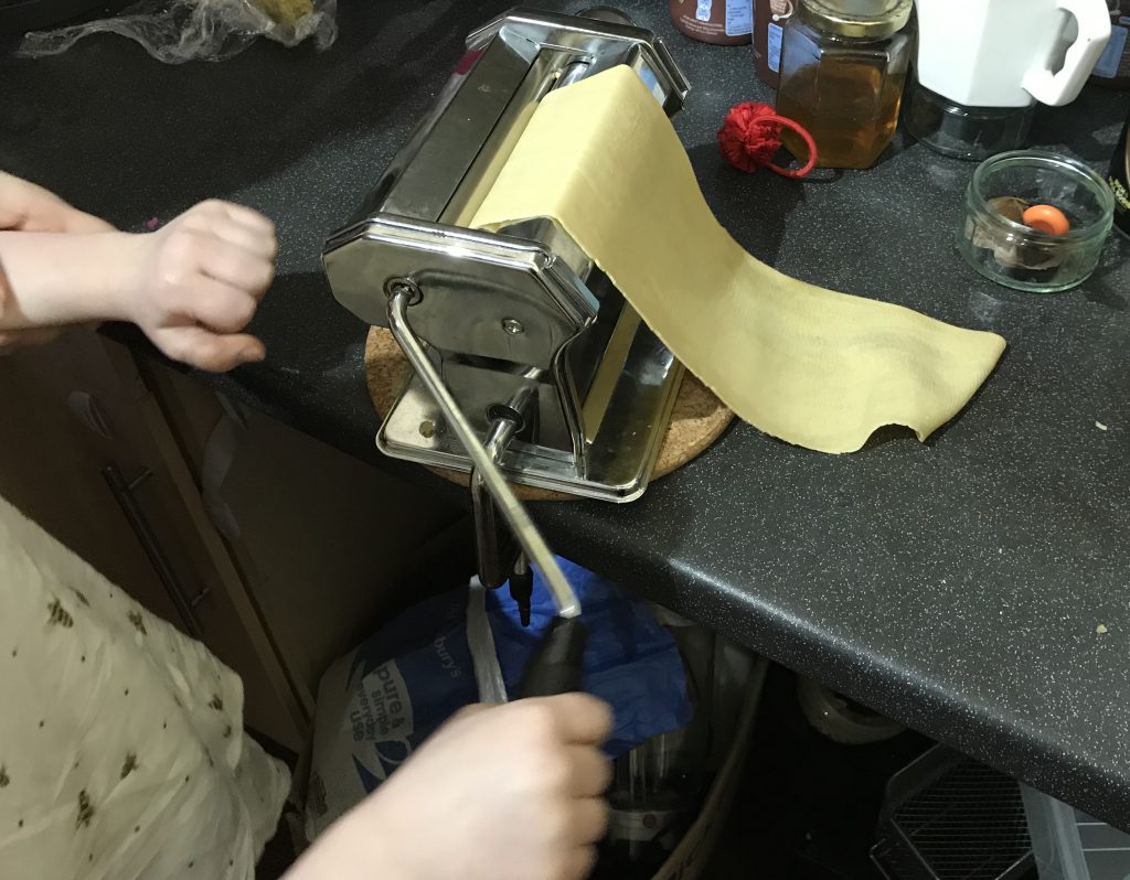 Pasta rolling machine with pasta