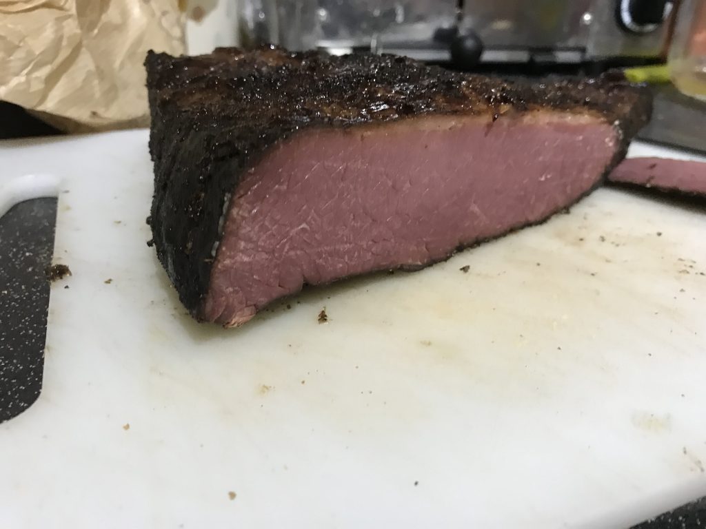 Cured brisket cooked on smoker
