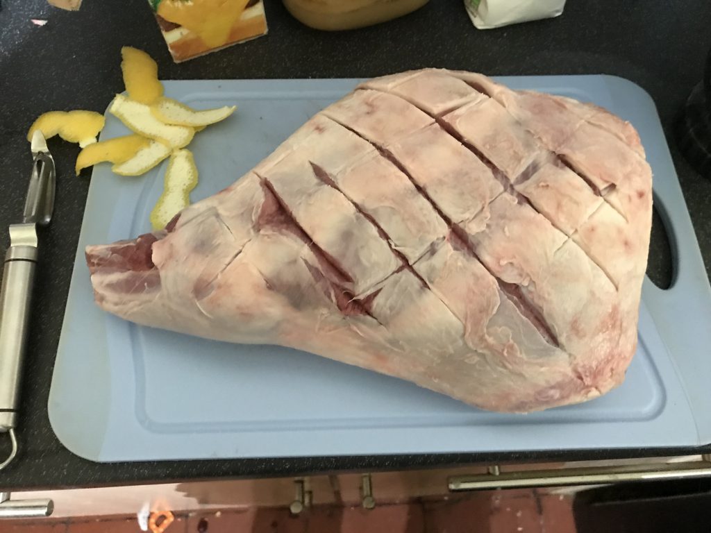 Raw leg of lamb waiting for it's BBQ rub
