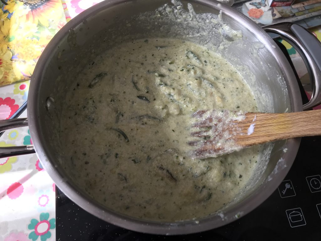 Saucepan full of courgette and goats cheese soup