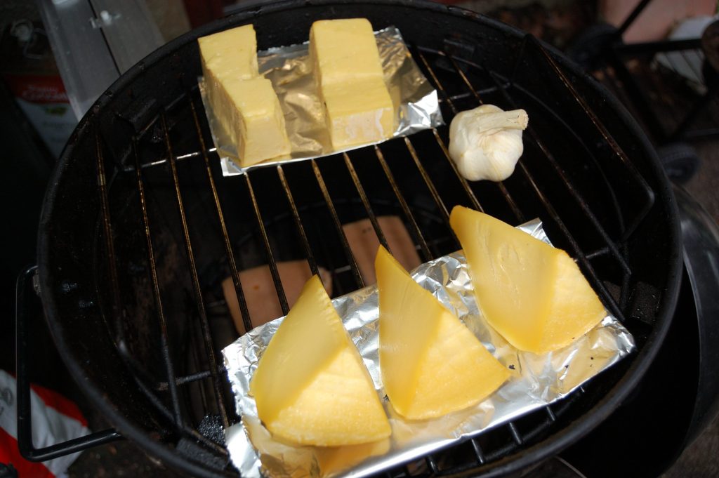 Cheese, garlic and bacon after being cold smoked.