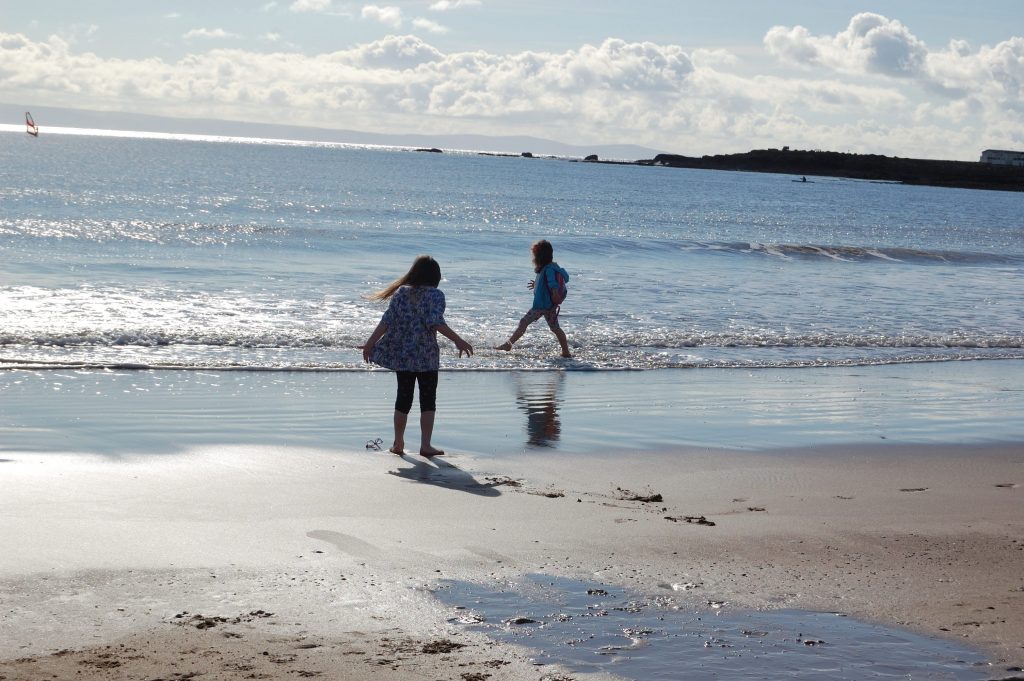 Two monsters playing in the sea.