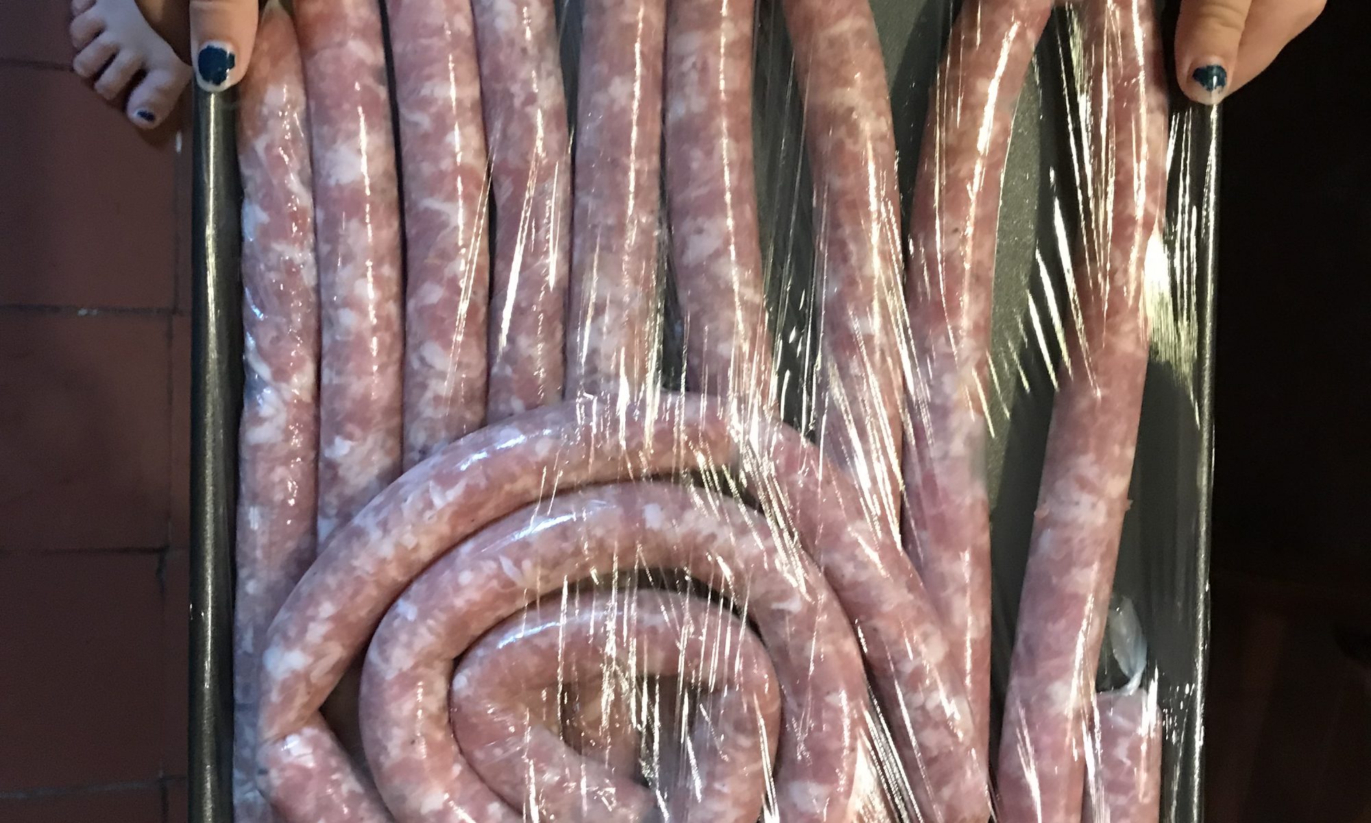 A tray of homemade sausages.