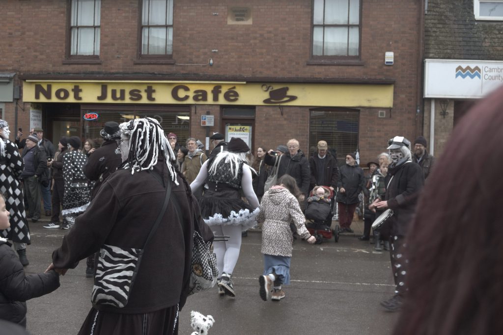 The Molly Dancers inviting spectators to join thier dance.