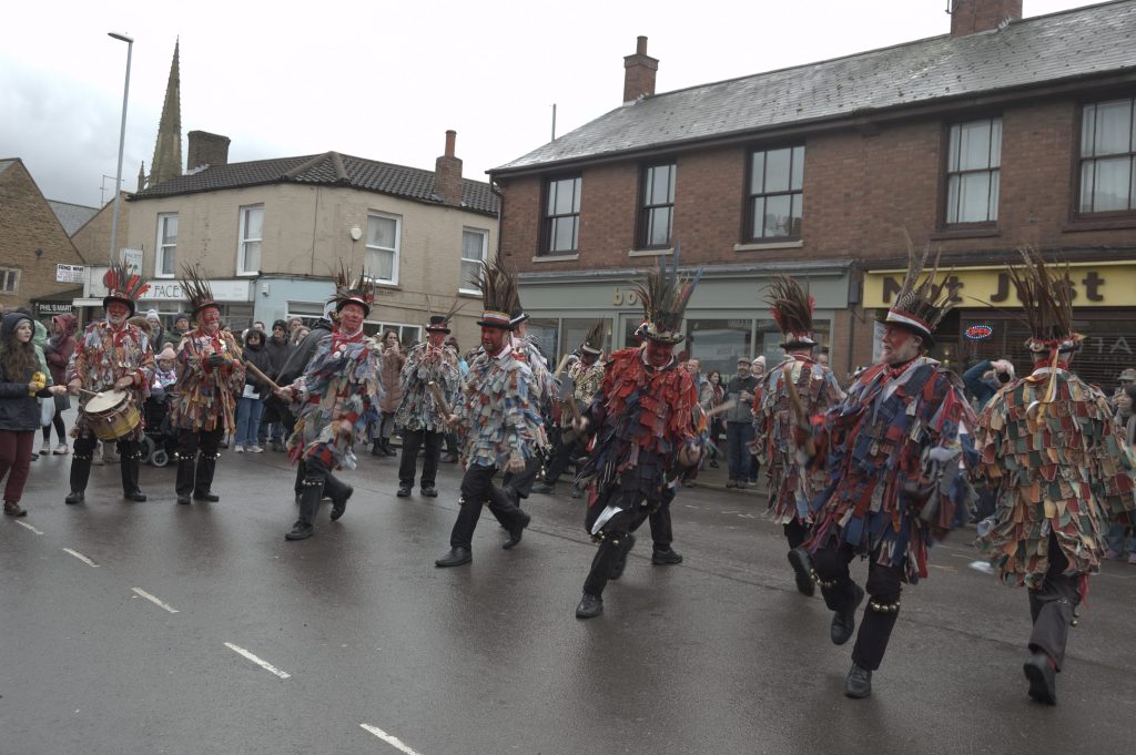 Red Leicetser Morris Men mid routine.